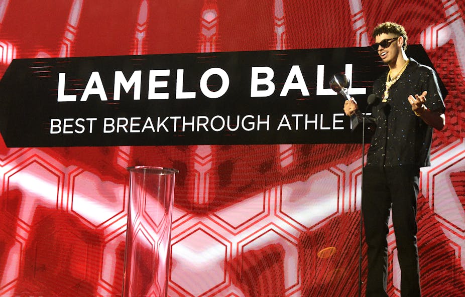 NBA star LaMelo Ball at an awards ceremony.