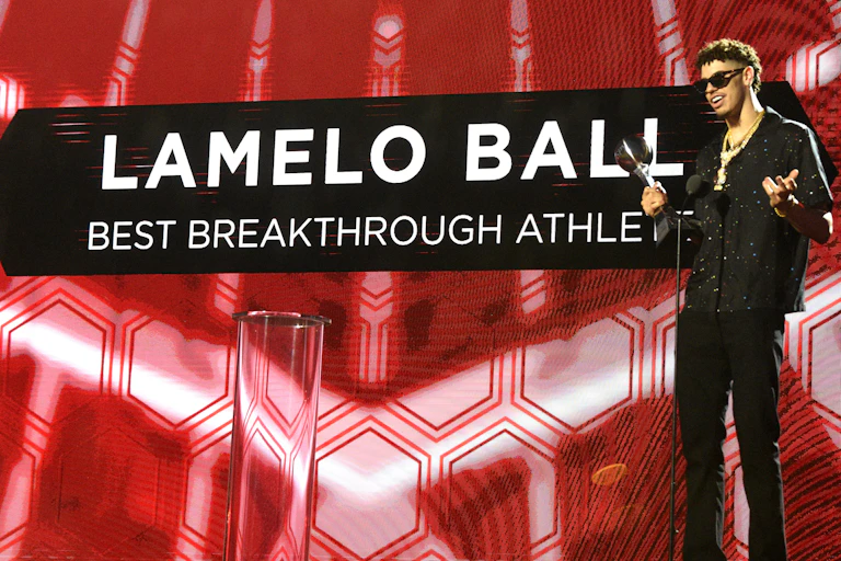 NBA star LaMelo Ball at an awards ceremony.