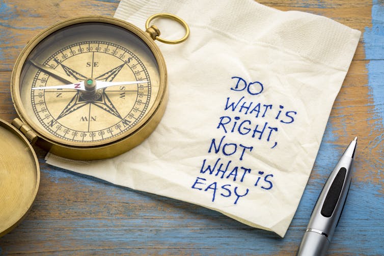 compass on a paper napkin with the written words 'Do what is right, not what is easy'