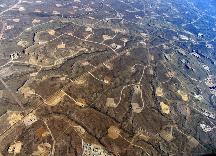 A heavy fracking area, with wells connected by roads