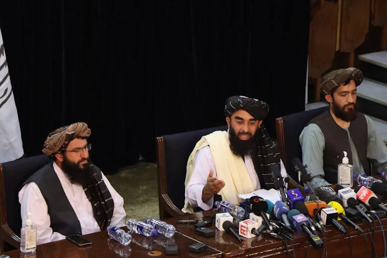 Three senior Taliban leaders at a press conference in Kabul, August 17 2021.