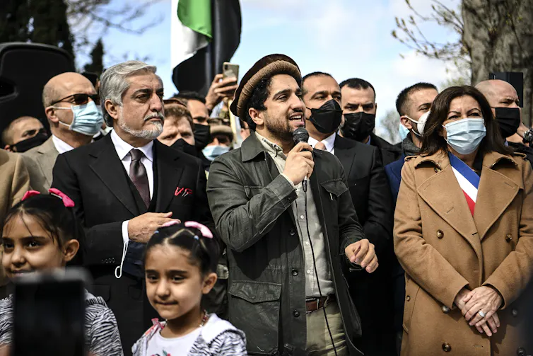 Afghan politician Abdullah Abdullah and warlord Ahmad Massoud at a ceremony to honour Massoud's father the late warlord Ahmad Shah Massoud.