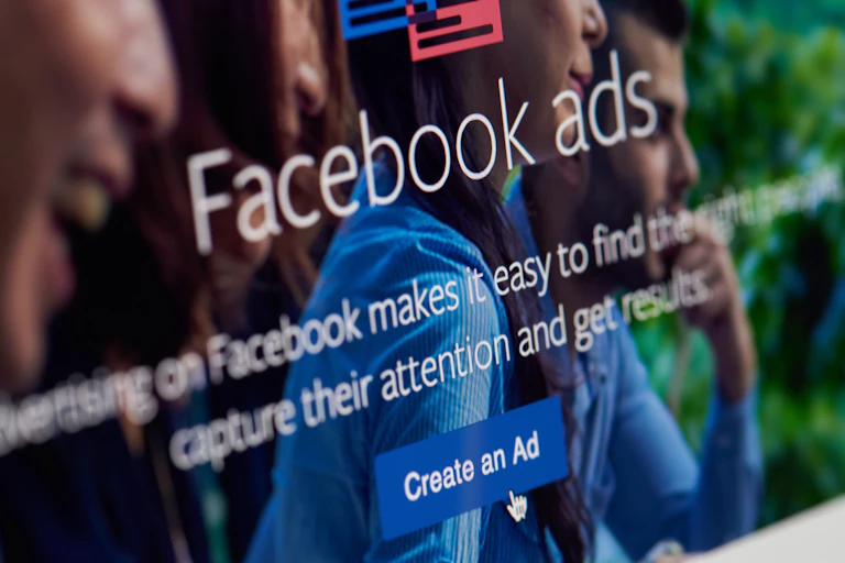 Photo of a computer screen reading FACEBOOK ADS CREATE AN AD