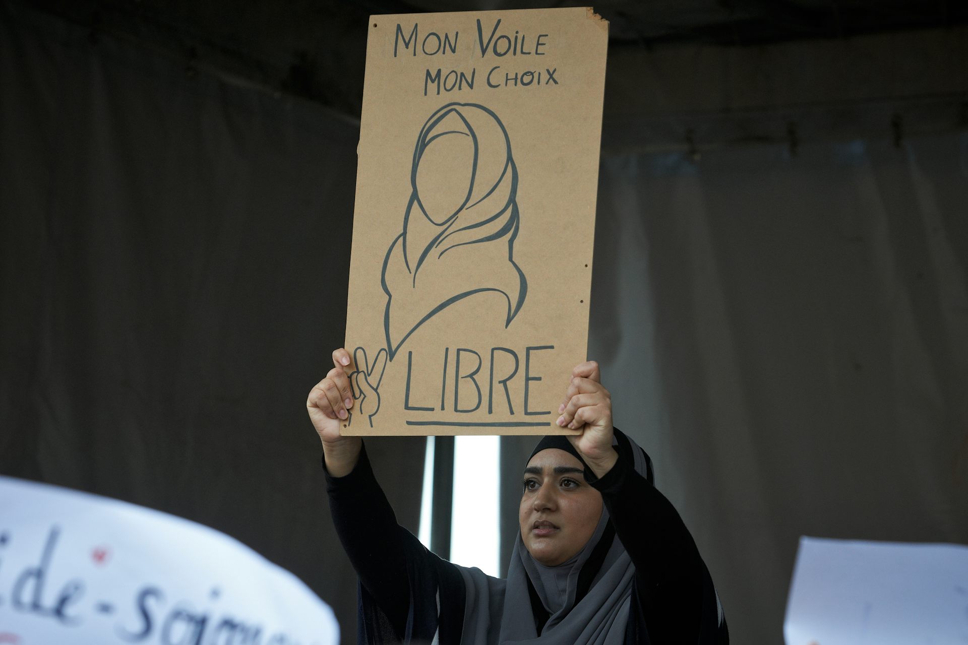 A Woman At A Protest Against Islamphobia In Toulouse, France, Shows A ...