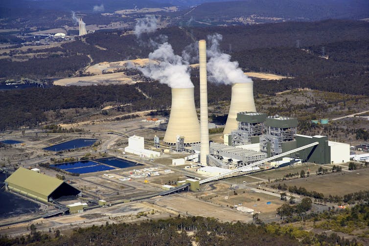 Steam billows from coal plant