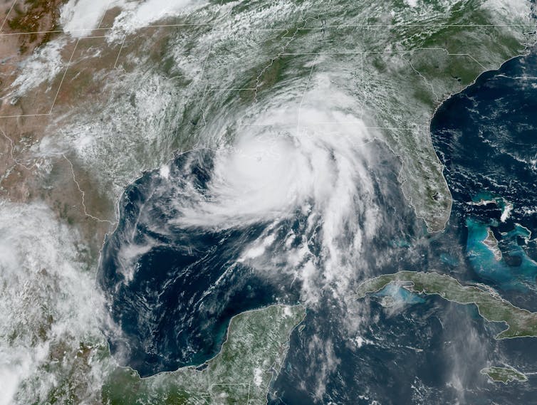 A satellite view of the hurricane over the Gulf of Mexico and coast.