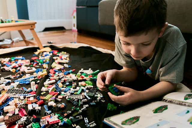 Boy playing with lego