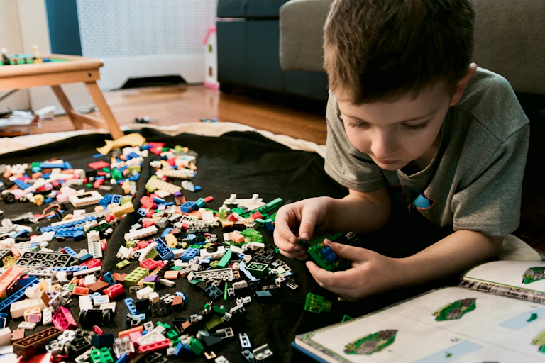Boy playing with lego