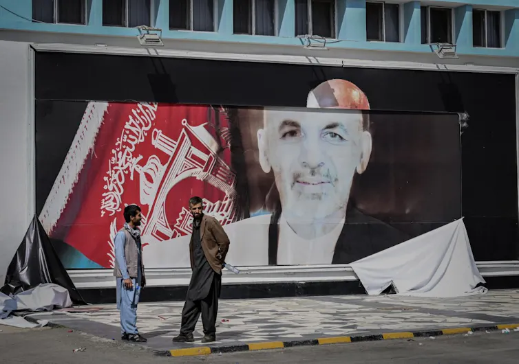 A billboard of former president Ashraf Ghani outside Kabul airport, August 16 2021