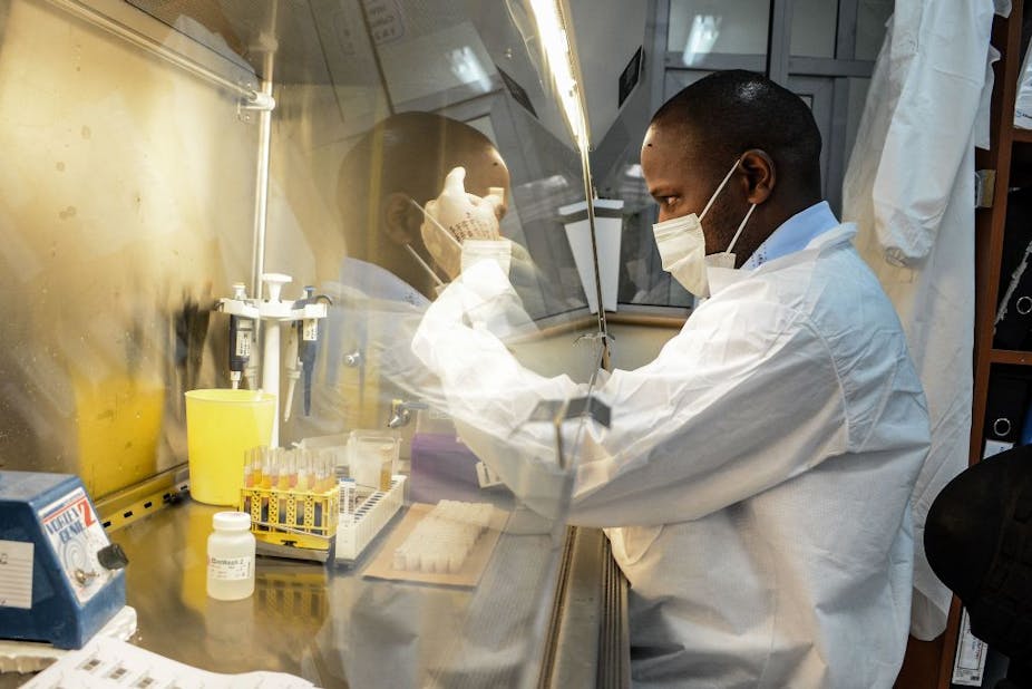 A researcher prepares reagents for testing the samples for the COVID-19 coronavirus at the laboratory of Kenya Medical Research Institute (KEMRI).