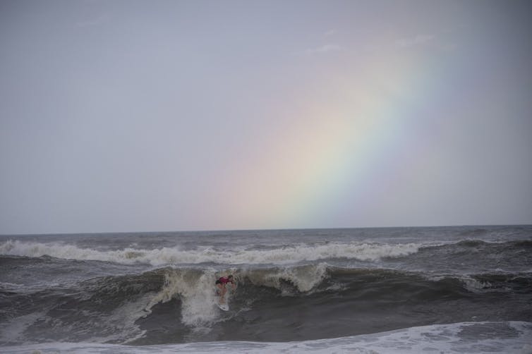 South Africa’s Bianca Buitendag rides a wave during the gold medal final at the Tokyo 2020 Olympic Games