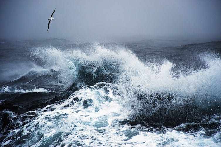 Rough waters, with foamy, breaking waves