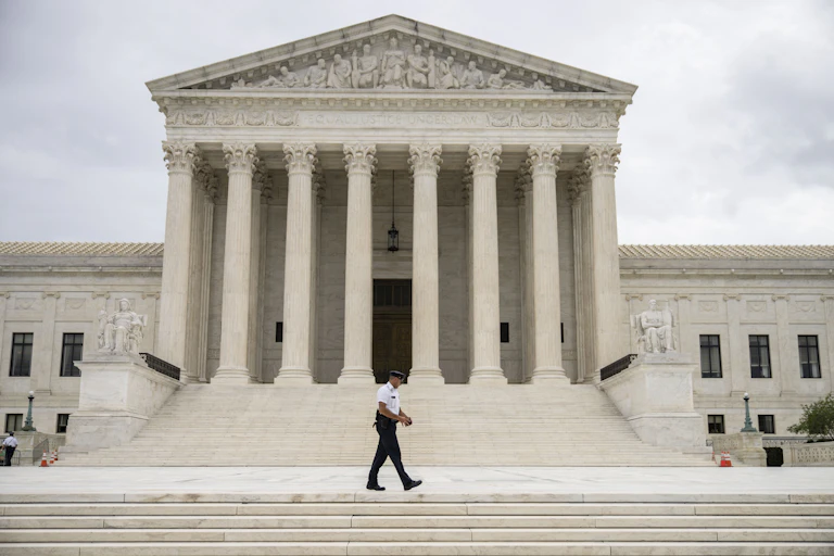 A Supreme Court Police officer patrols at the U.S. Supreme Court on September 1, 2021 in Washington, D.C.