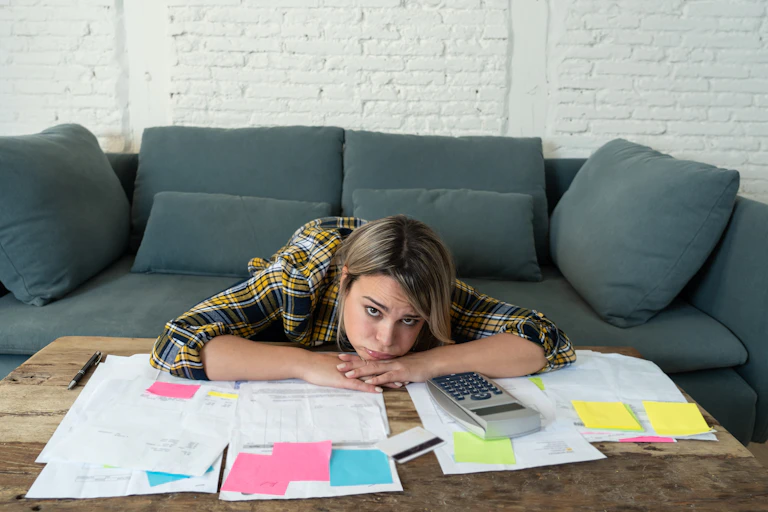 Worried-looking woman doing her tax return