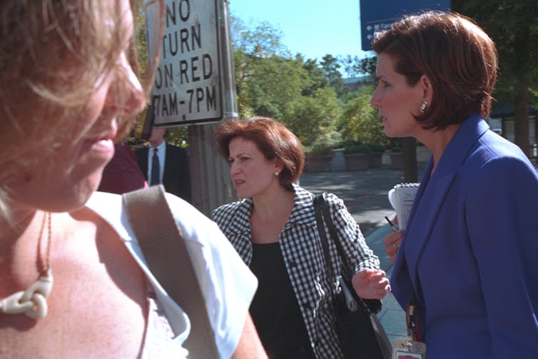 Two women outside the White House.