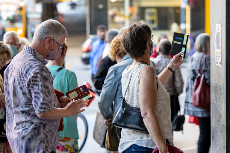 People scanning in QR codes