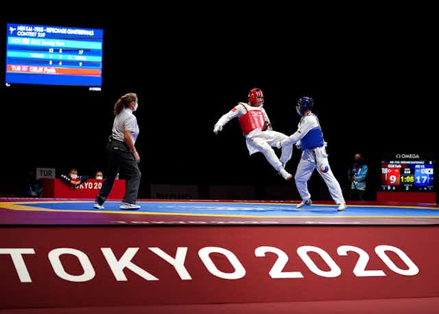 Turkey's Fatih Celik (left) and Korea's Jeong Hun Joo compete during day ten of the Tokyo 2020 Paralympic Games in Japan