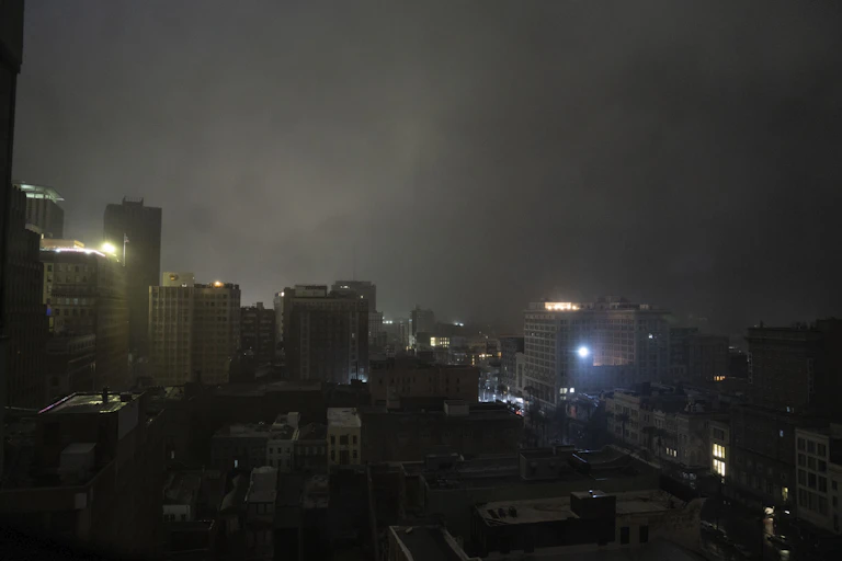 Downtown New Orleans with most buildings dark.