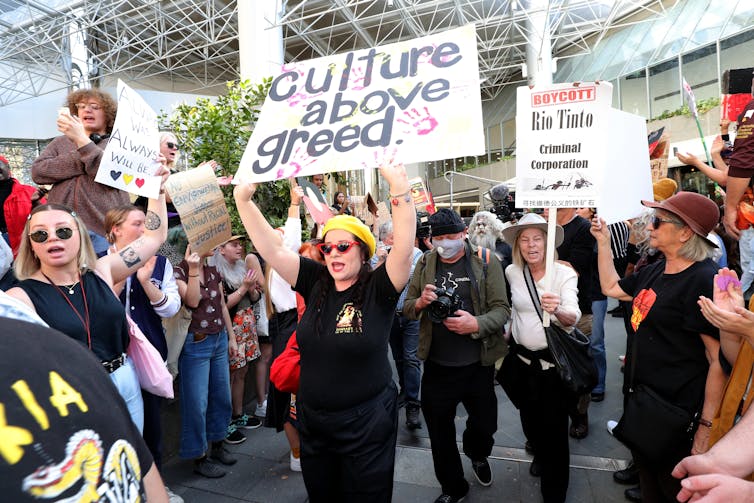 Protesters during a rally outside the Rio Tinto office in Perth.