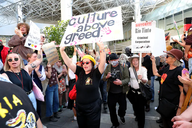 Protesters during a rally outside the Rio Tinto office in Perth.