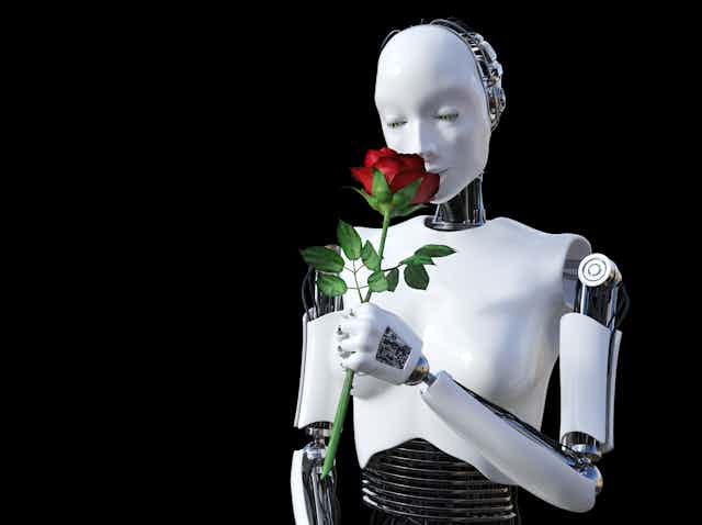 robot oliendo una rosa roja.