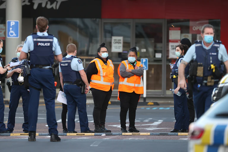 P{olice outside the supermarket where a terror attack took place