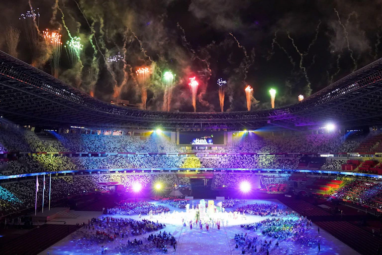 Fireworks and bright lights colour Tokyo's stadium during the closing ceremony of the Tokyo 2020 Games