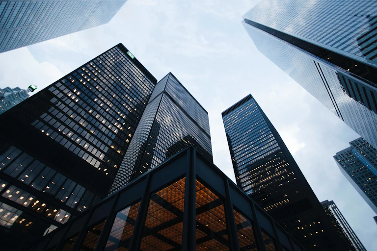 Skyline of financial offices looming overhead