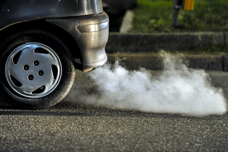 A car exhaust in traffic.