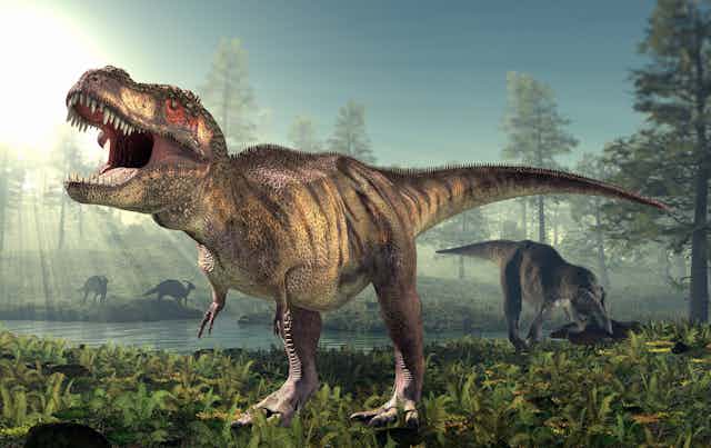 A _Tyrannosaurus rex_ -- a huge dinosaur with a big head and teeth and little front legs --  walks the ground of an ancient forest.