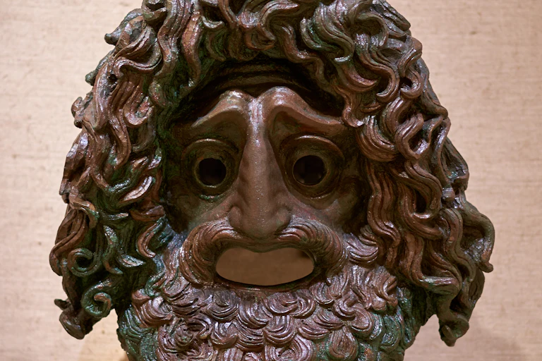 A Greek tragedy mask.