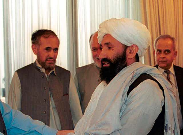 Mullah Hasan Akhund as part of a delegation of Afghan ministers meeting then Pakistani prime minister Nawaz Sharif in 1999.