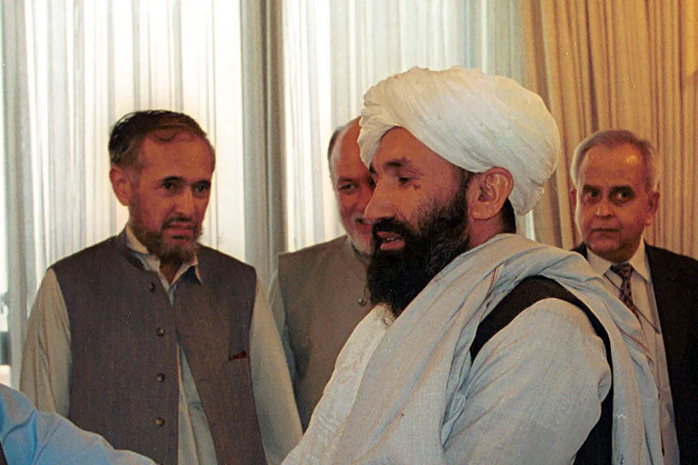 Mullah Hasan Akhund as part of a delegation of Afghan ministers meeting then Pakistani prime minister Nawaz Sharif in 1999.