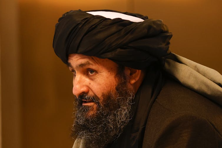 Abdul Ghani Baradar attending peace talks in March 2021.