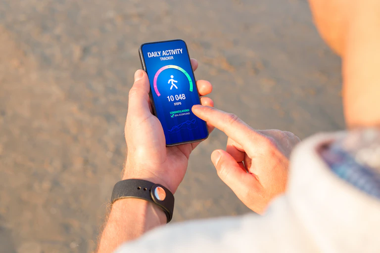 Person looking at the number of steps they've done in a day