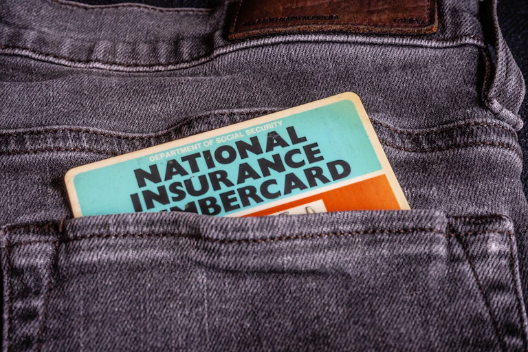 National insurance card in back pocket.