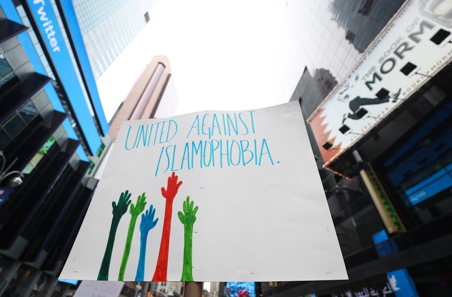 Demonstrators in New York hold a sign that says "United against Islamophobia" after the 2019 attack on a mosque in Christchurch, New Zealand.