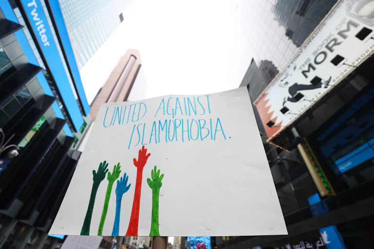 Demonstrators in New York hold a sign that says "United against Islamophobia" after the 2019 attack on a mosque in Christchurch, New Zealand.