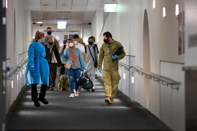 Passenger from Afghanistan disembark in Australia