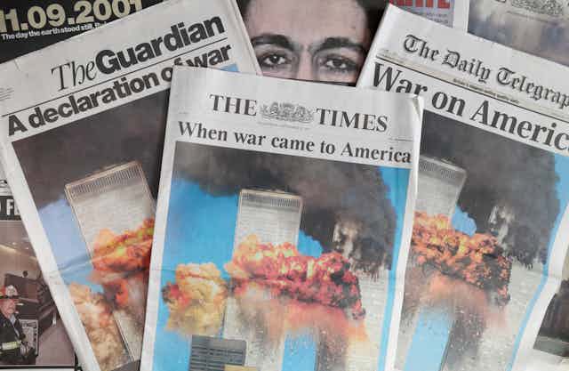 Front pages of British newspapers the day after 9/11, all with photos of the exploding World Trade Centre.