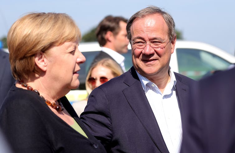 Angela Merkel and Armin Laschet out campaigning.