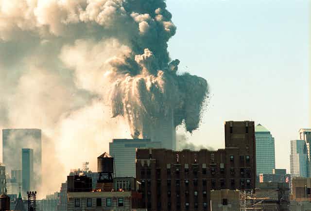 World Trade Center collapses after being hit by an aircraft hijacked by terrorists.