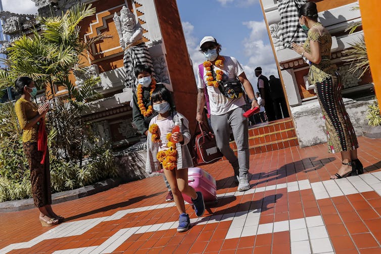 Domestic visitors arriving in Bali.