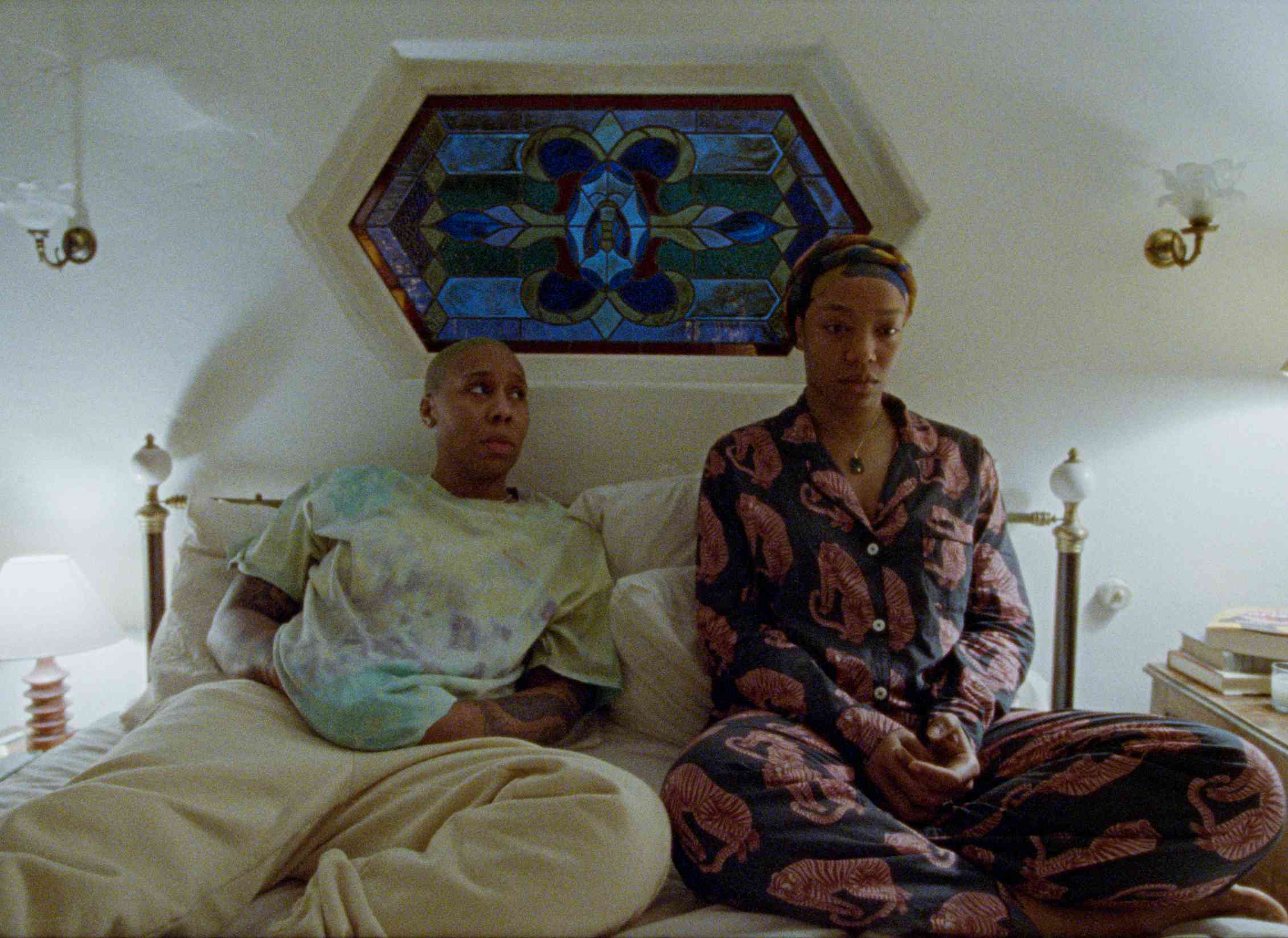 Two Back women in Bed