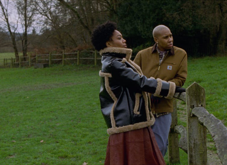 Two Black women in a green paddock