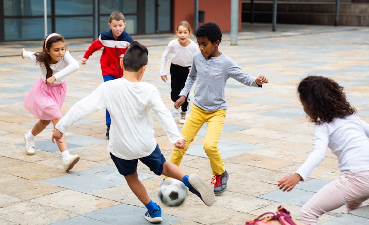 kids playing sport in schoolyard