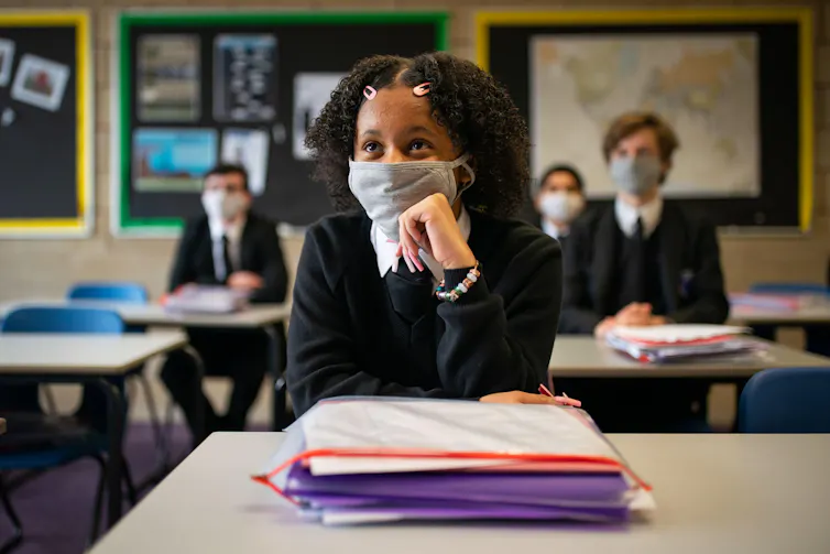 Year 11 students wear facemasks in class
