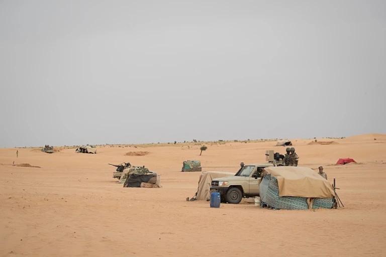 Mauritanian soldiers stand guard in the southeast of Mauritania near the border with Mali.