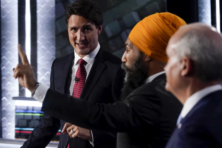 Liberal Leader Justin Trudeau, left to right, NDP Leader Jagmeet Singh, and Conservative Leader Erin O'Toole take part in the federal election English-language Leaders debate