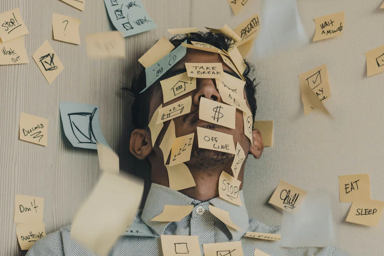 Man covered in Post-It notes